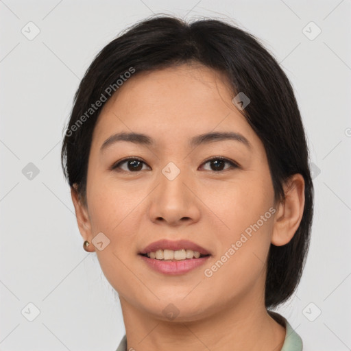 Joyful asian young-adult female with medium  brown hair and brown eyes