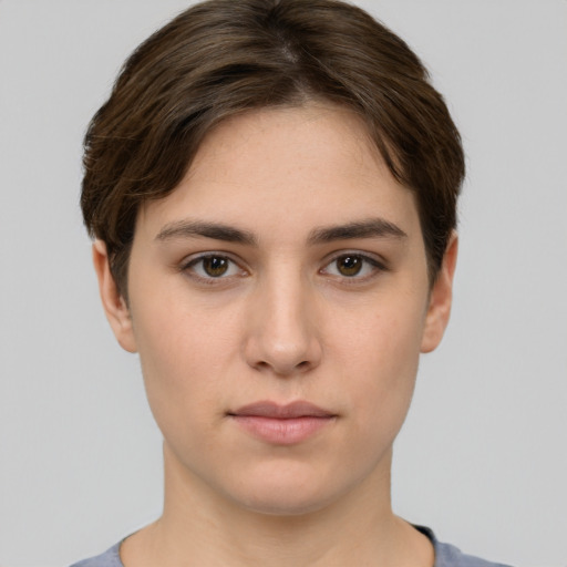 Neutral white young-adult female with short  brown hair and brown eyes