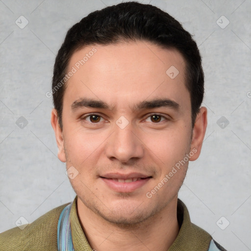 Joyful white young-adult male with short  black hair and brown eyes