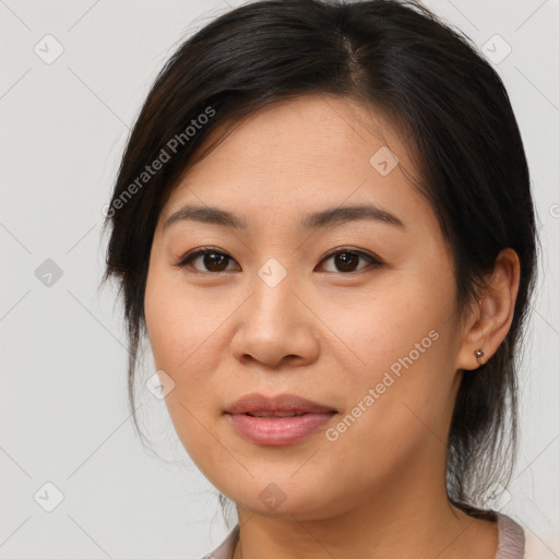 Joyful white young-adult female with medium  brown hair and brown eyes