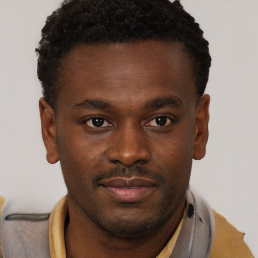 Neutral black young-adult male with short  brown hair and brown eyes