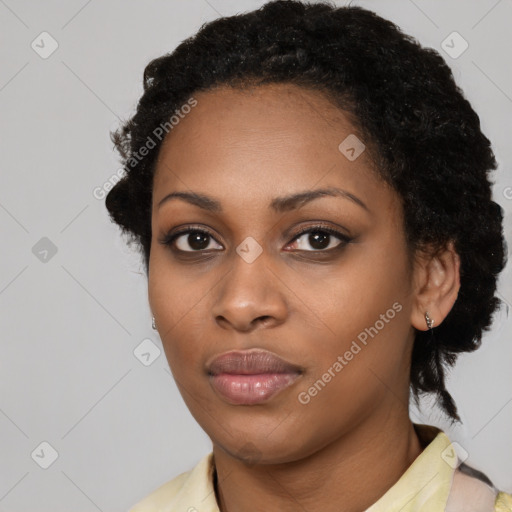 Neutral black young-adult female with short  black hair and brown eyes