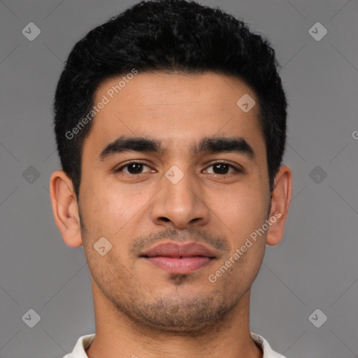 Joyful latino young-adult male with short  black hair and brown eyes