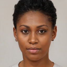 Neutral black young-adult female with short  brown hair and brown eyes