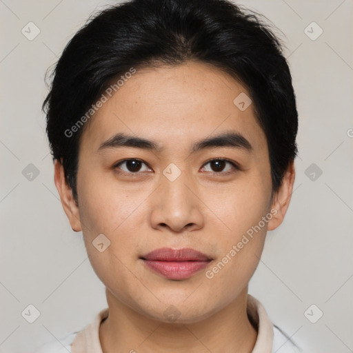 Joyful asian young-adult male with short  brown hair and brown eyes