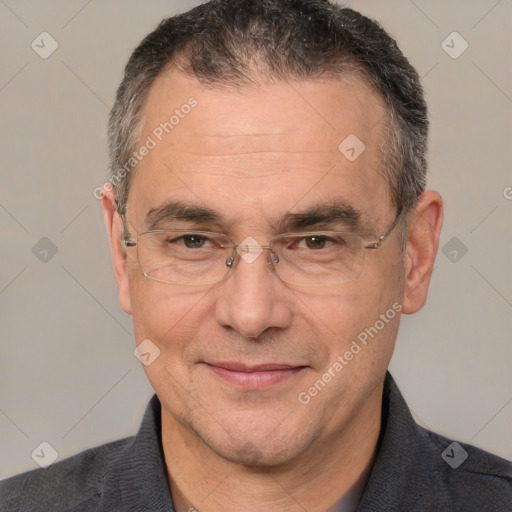 Joyful white middle-aged male with short  brown hair and brown eyes