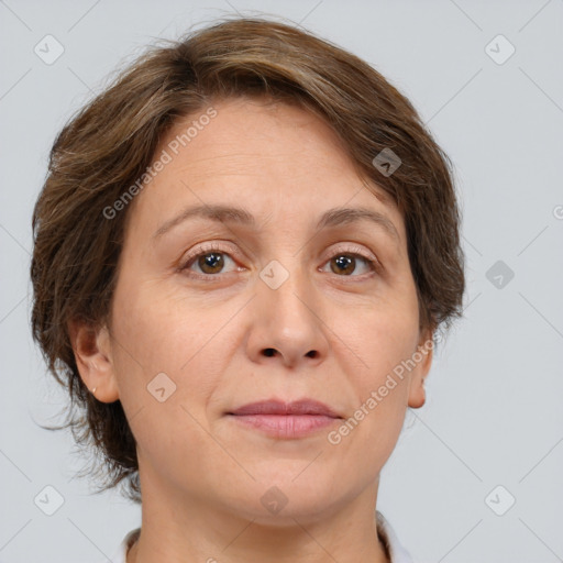 Joyful white adult female with medium  brown hair and brown eyes