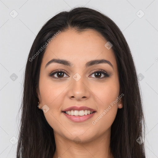 Joyful white young-adult female with long  brown hair and brown eyes