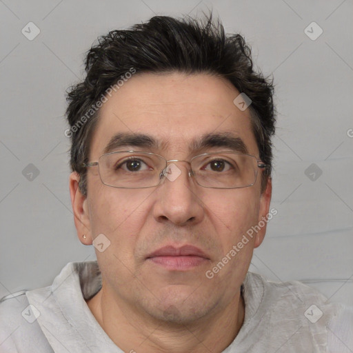 Neutral white adult male with short  black hair and brown eyes