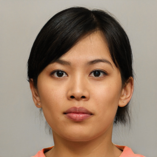 Neutral asian young-adult female with medium  black hair and brown eyes