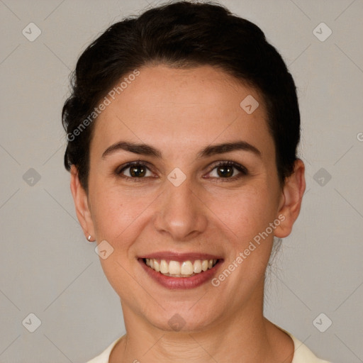 Joyful white young-adult female with short  brown hair and brown eyes