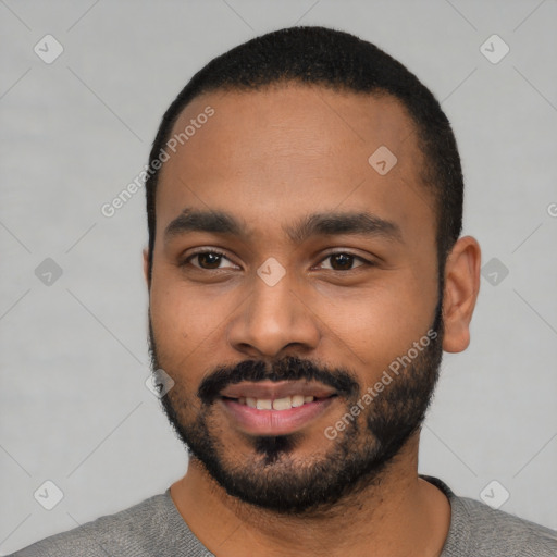 Joyful latino young-adult male with short  black hair and brown eyes