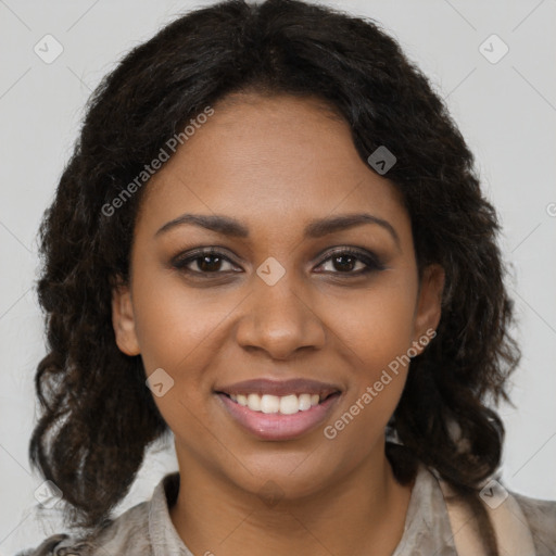 Joyful black young-adult female with long  brown hair and brown eyes