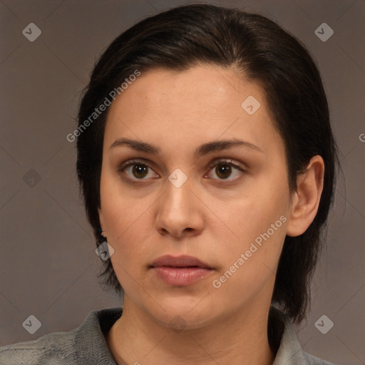 Neutral white young-adult female with medium  brown hair and brown eyes