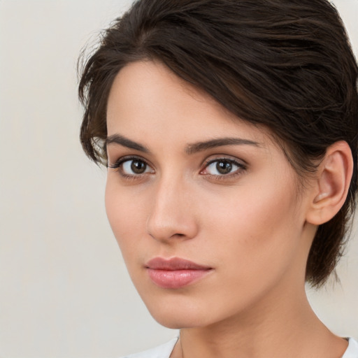 Neutral white young-adult female with medium  brown hair and brown eyes