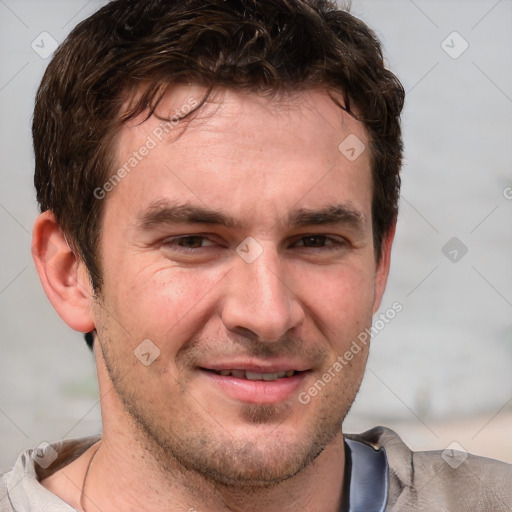 Joyful white adult male with short  brown hair and grey eyes