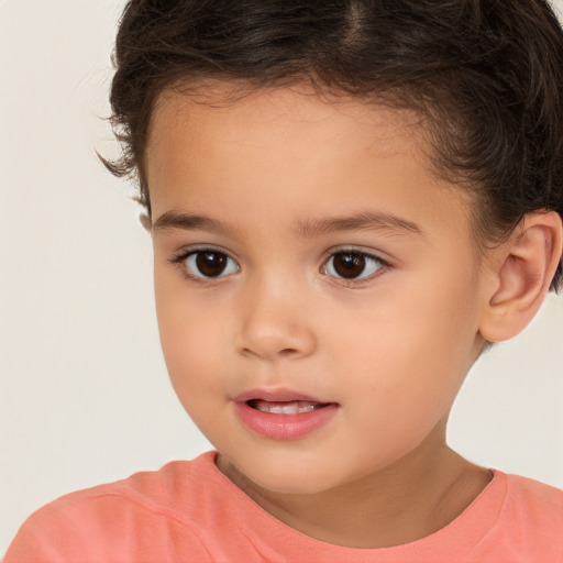 Joyful white child female with short  brown hair and brown eyes