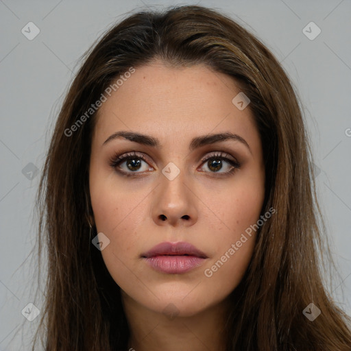 Neutral white young-adult female with long  brown hair and brown eyes