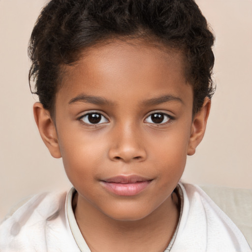 Joyful white child female with short  brown hair and brown eyes