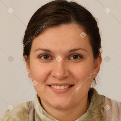 Joyful white adult female with short  brown hair and brown eyes