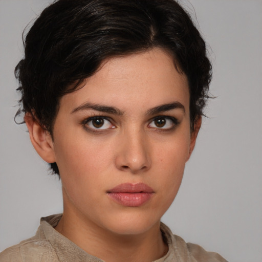 Neutral white young-adult female with short  brown hair and brown eyes