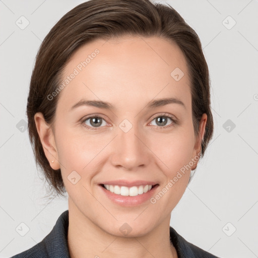 Joyful white young-adult female with medium  brown hair and grey eyes