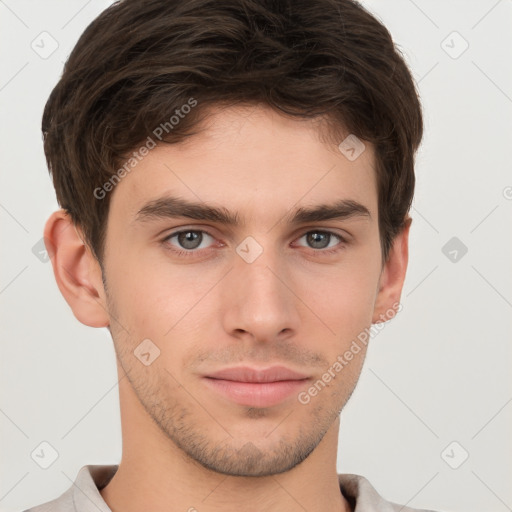 Neutral white young-adult male with short  brown hair and brown eyes