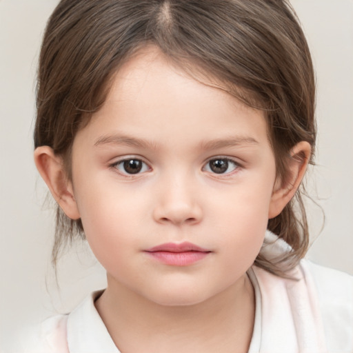 Neutral white child female with medium  brown hair and brown eyes