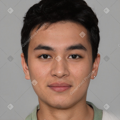 Joyful asian young-adult male with short  black hair and brown eyes