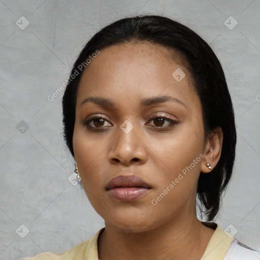 Neutral black young-adult female with medium  black hair and brown eyes