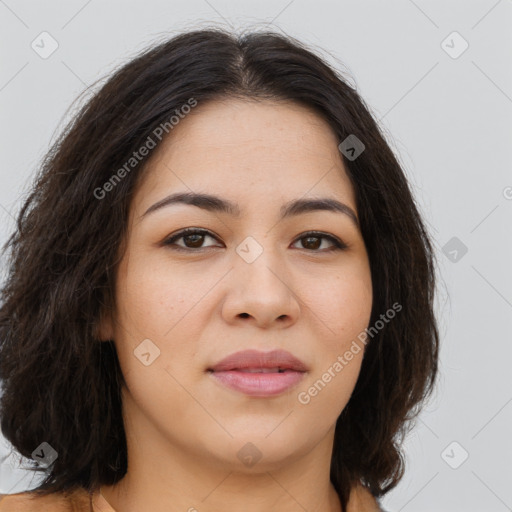 Joyful asian young-adult female with long  brown hair and brown eyes