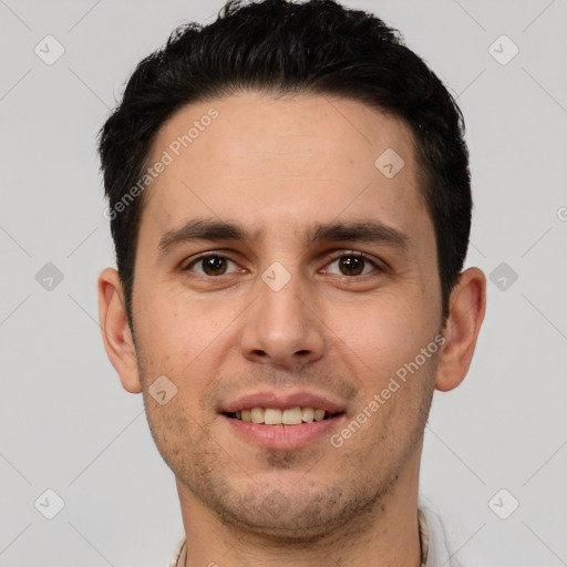 Joyful white young-adult male with short  brown hair and brown eyes