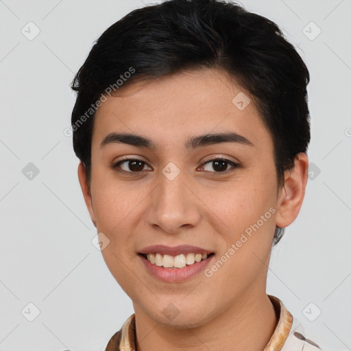 Joyful latino young-adult female with short  brown hair and brown eyes