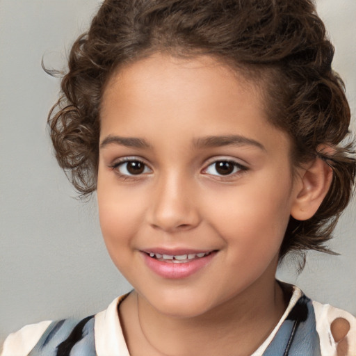 Joyful white child female with medium  brown hair and brown eyes