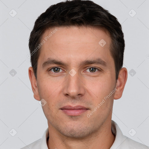 Neutral white young-adult male with short  brown hair and brown eyes