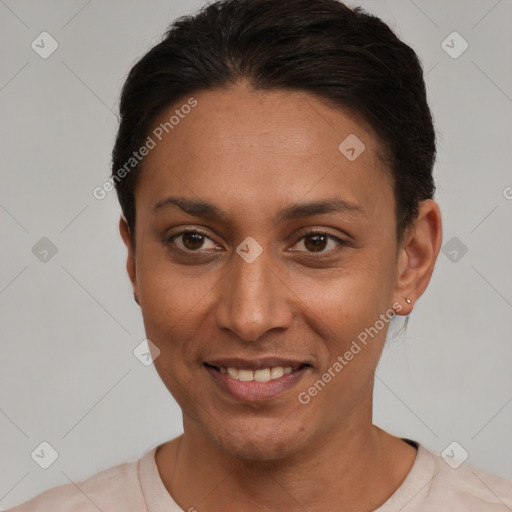 Joyful latino young-adult female with short  brown hair and brown eyes