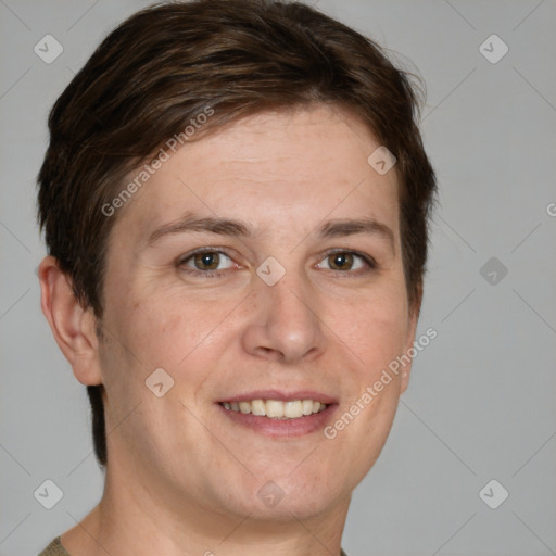 Joyful white adult female with short  brown hair and grey eyes