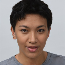 Joyful asian young-adult female with short  black hair and brown eyes