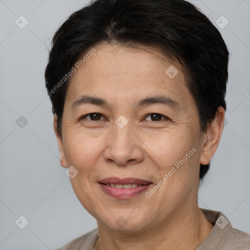 Joyful white adult female with short  brown hair and brown eyes