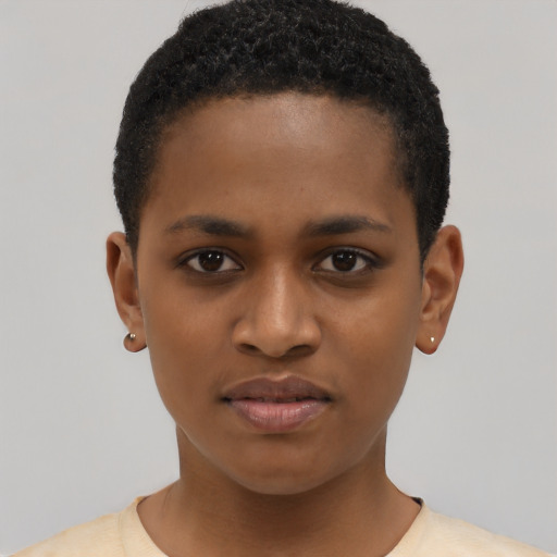 Joyful latino young-adult female with short  black hair and brown eyes