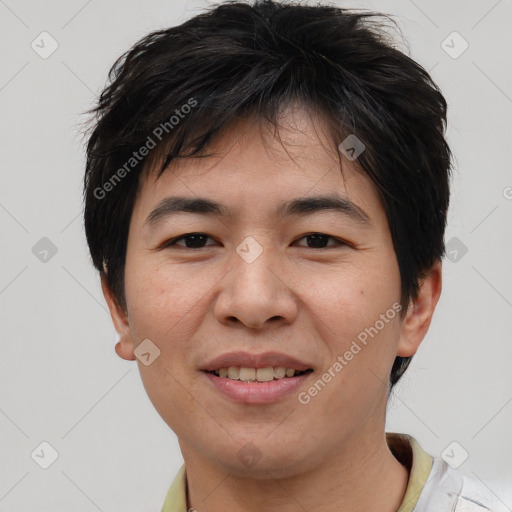 Joyful asian young-adult male with short  brown hair and brown eyes