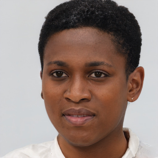 Joyful black young-adult female with short  black hair and brown eyes