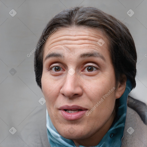 Joyful white adult female with medium  brown hair and brown eyes