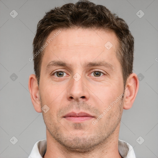 Neutral white adult male with short  brown hair and brown eyes