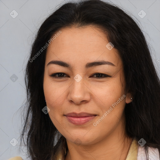 Joyful asian young-adult female with long  brown hair and brown eyes