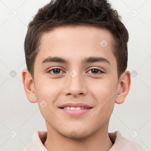 Joyful white child male with short  brown hair and brown eyes