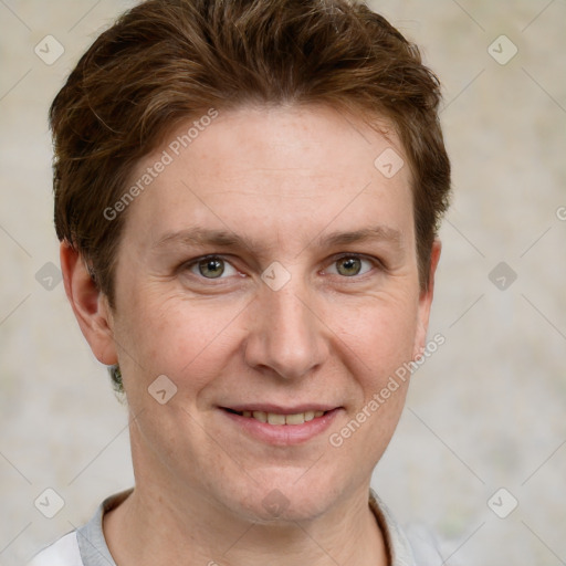 Joyful white adult female with short  brown hair and grey eyes