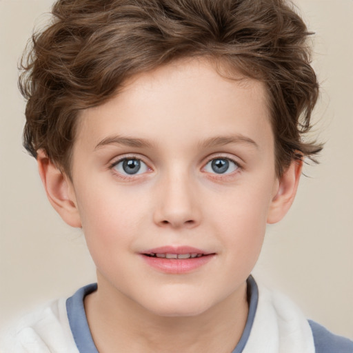 Joyful white child female with short  brown hair and blue eyes