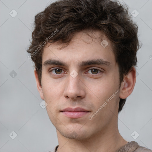 Neutral white young-adult male with short  brown hair and grey eyes