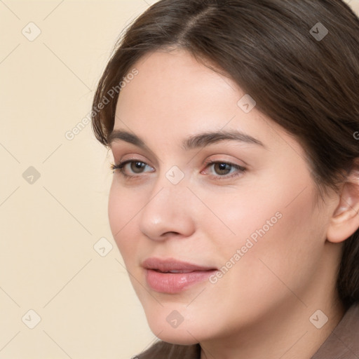 Neutral white young-adult female with long  brown hair and brown eyes